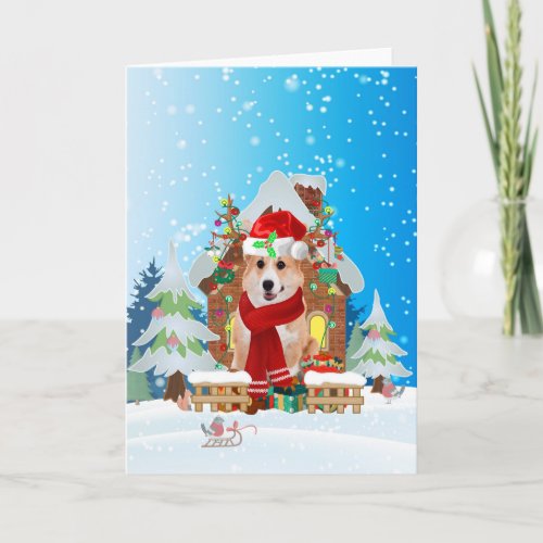 Corgi in snow with Christmas gifts Card