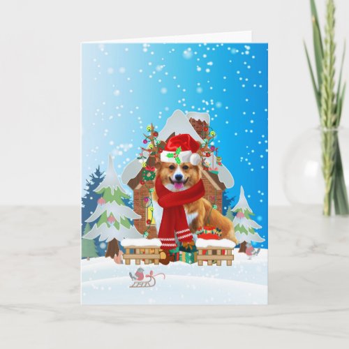 Corgi in snow with Christmas gifts Card