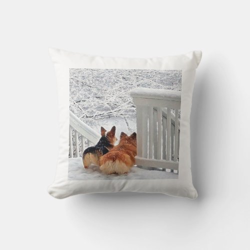 Corgis in the snow throw pillow