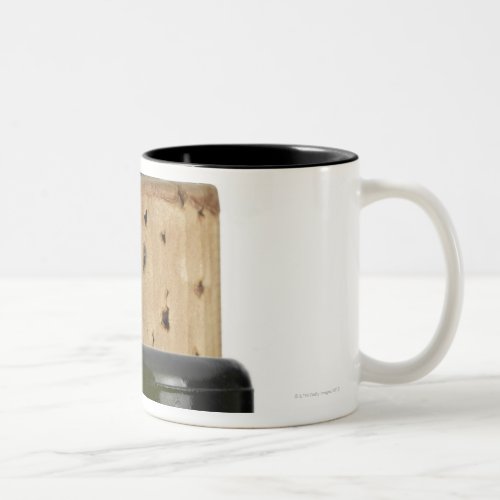 Corkscrew and cork photographed on white Two_Tone coffee mug