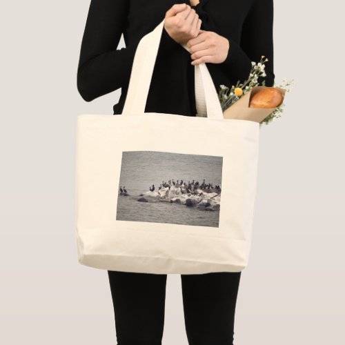 Cormorants on the island of the river large tote bag