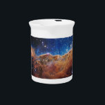 Cosmic Cliffs Carina Nebula Space Webb Telescope  Beverage Pitcher<br><div class="desc">In the heart of the Carina Nebula, 7, 600 light-years away, lies a scene of breathtaking cosmic violence. Here, the edge of a gigantic gaseous cavity rears up like a monstrous wall, its surface sculpted into a fantastical landscape of peaks and valleys. These are the aptly named "Cosmic Cliffs, "...</div>