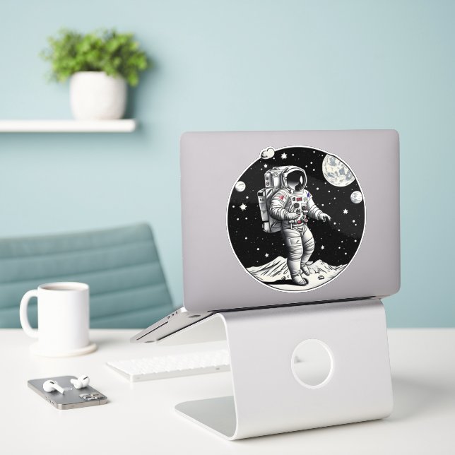 Cosmic Drift Astronaut Sticker (Laptop On Desk)