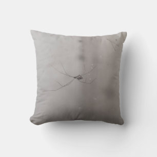 cosmopolitan cellar spider throw pillow