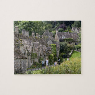 Cotswold stone cottages in the village of jigsaw puzzle