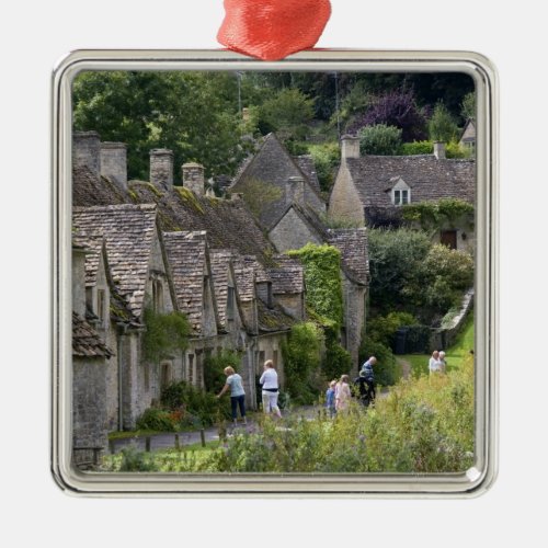 Cotswold stone cottages in the village of metal ornament