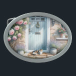 Cottagecore Floral Porch with Calico Cat Belt Buckle<br><div class="desc">This charming artwork captures the heart of cottagecore aesthetic with a serene scene set before a pastel blue door framed by blooming pink roses and potted lavender. A content calico cat lounges peacefully on the doorstep, adding a cozy, lived-in touch that evokes the warmth of a slow, rural lifestyle. Overflowing...</div>