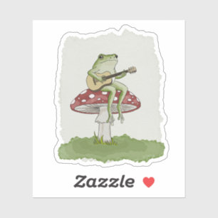 Cottagecore Frog Playing Guitar on Mushroom Art Sticker