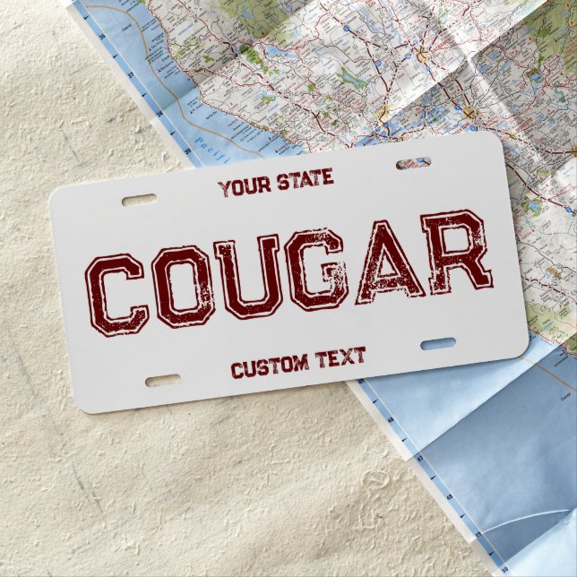 Cougar custom red vanity car license plate (In Situ)