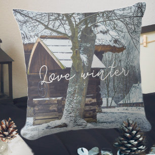 Country cottage in the snow throw pillow