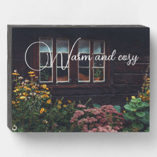Country cottage with rustic garden wooden box sign