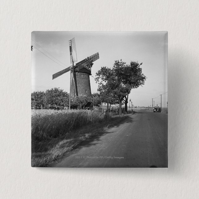 Country road and traditional windmill button (Front)