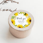 Country Sunflower Thank You Wedding Favor Sticker<br><div class="desc">These country sunflower thank you wedding favor stickers are perfect for a rustic wedding reception. The classic modern design features beautiful bright yellow watercolor wildflowers with a vintage outdoor summer or fall theme. Personalize the sticker labels with your names, the event (if applicable), and the date. These stickers can be...</div>