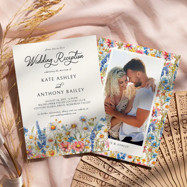 A wedding reception invite with a colorful wildflower theme. Some foliage is casting a shadow over the invite, and a couple are depicted on the back of the invite.