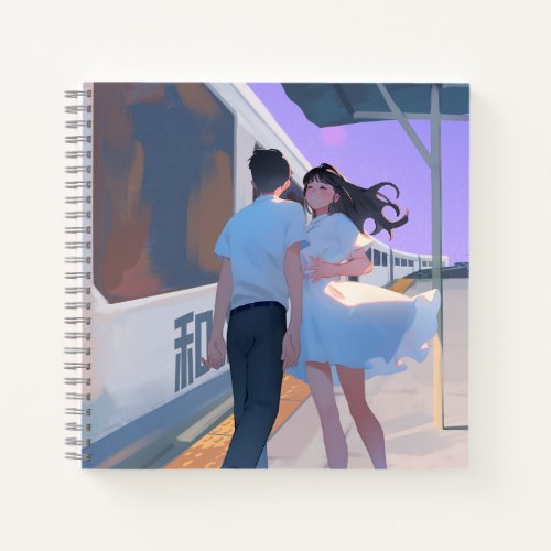 Couple at a train station notebook