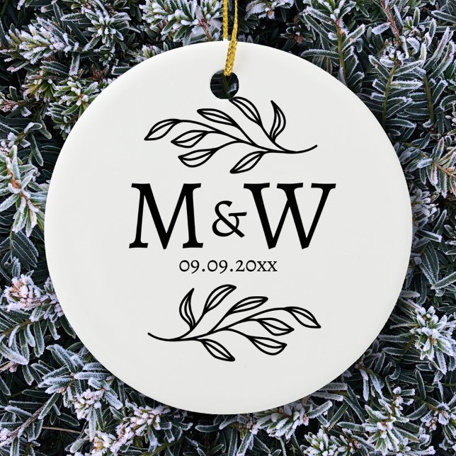 Couple Monogram Wedding Date Elegant Botanical Ceramic Ornament (Modern couple monogram initials ceramic ornament with wedding date and botanical leaf detail.)