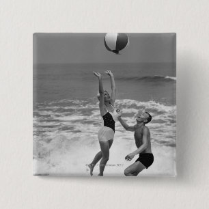 Couple Playing with a Beachball Button