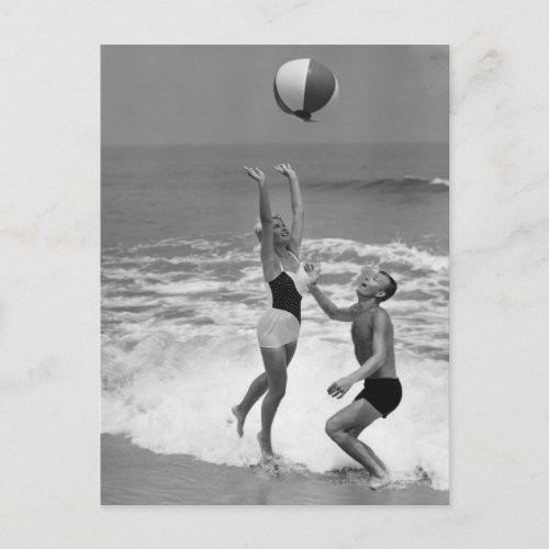 Couple Playing with a Beachball Postcard