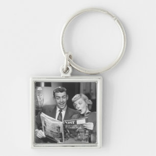 Couple Reading Magazine Keychain