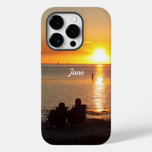 Couple Sit On Beach At Sunset Cell Phone Case
