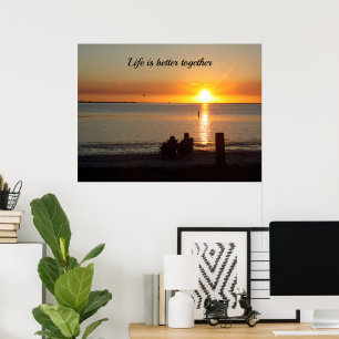 Couple Sit On Beach At Sunset Poster