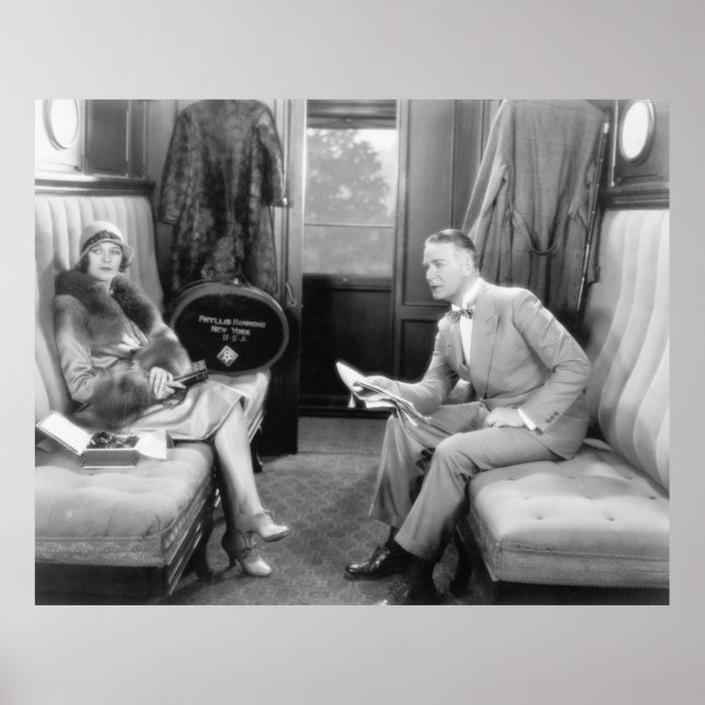 Couple sitting together in a compartment of a trai poster (Front)