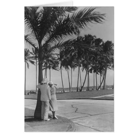 Couple standing at palm tree Rear view B&W Cards (Front)