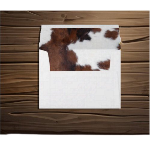 cow hide brown white envelope