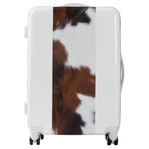 cow hide brown white luggage