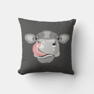 Cow licking nose throw pillow