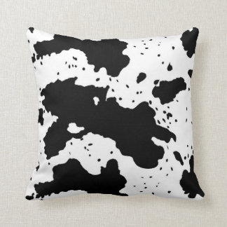 black and white cow print pillows