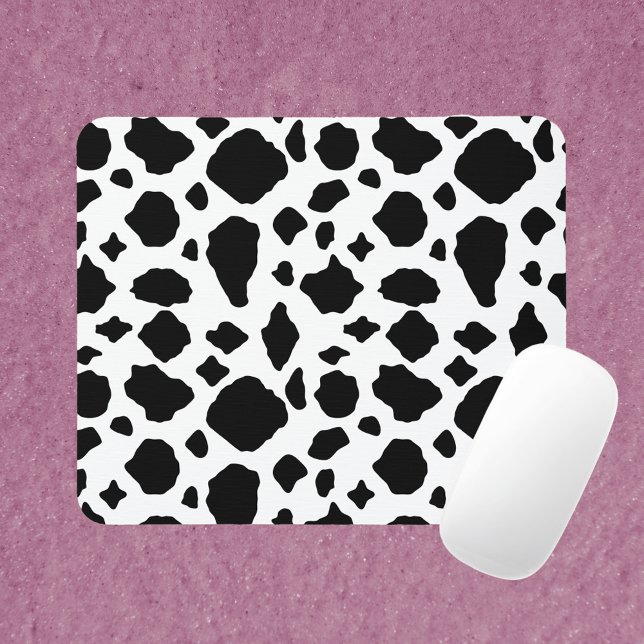 Cow Print Black and White Mouse Pad (A mouse pad with a black and white cow print pattern.)