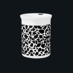Cow Print Pitcher<br><div class="desc">The black and white, spotted cow print of this pitcher will look great with everything! And the Zesty Zebra thinks its the perfect way to serve milk!</div>