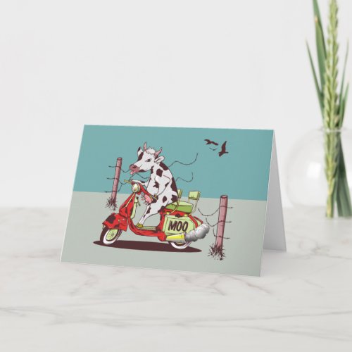 Cow riding a moped card