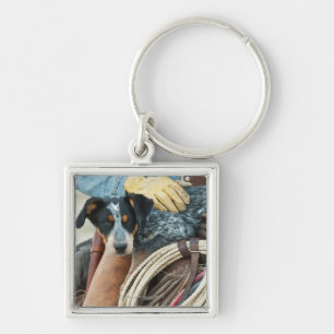 Cowboy and dog on horse keychain