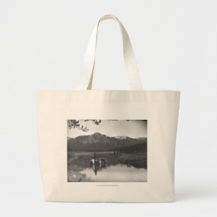 Cowboy and horse in a pond large tote bag