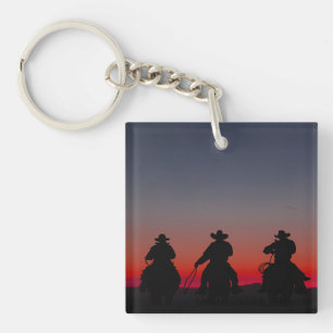 cowboy at sunset keychain