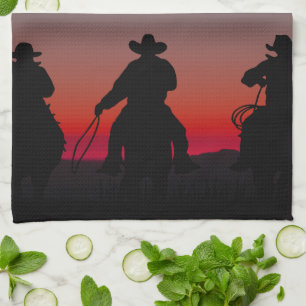 cowboy at sunset kitchen towel