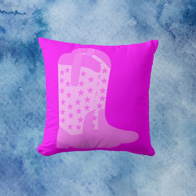 Cowboy Boots with Stars Pink Throw Pillow (A throw pillow with a pair of pink cowboy boots with stars on a pink background.)