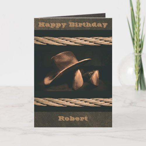 Cowboy hat boots and rope western style masculine card