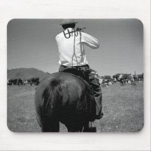Cowboy on a horse with two brands. mouse pad