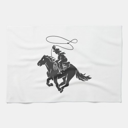 Cowboy on bucking horse running with lasso kitchen towel