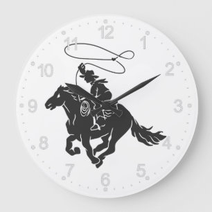 Cowboy on bucking horse running with lasso large clock