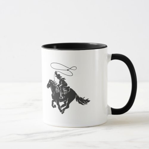 Cowboy on bucking horse running with lasso mug