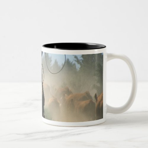 Cowboy on horse with lasso driving cattle Two_Tone coffee mug