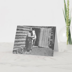 Cowboy reading a letter card