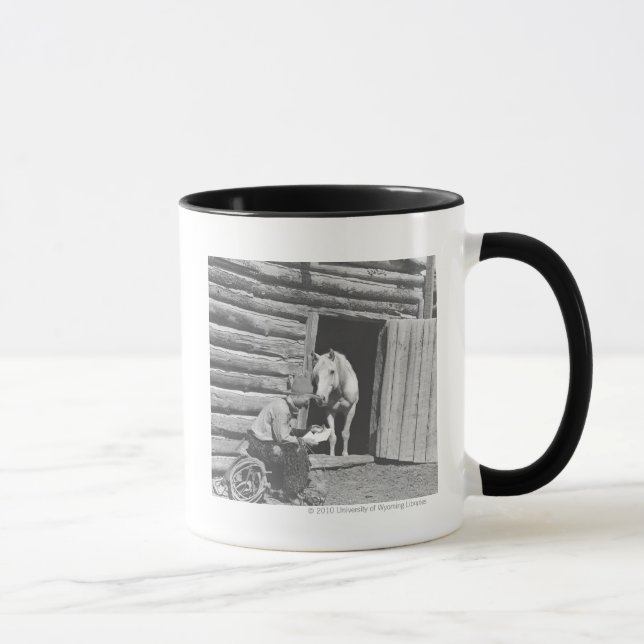 Cowboy reading a letter with a horse mug (Right)
