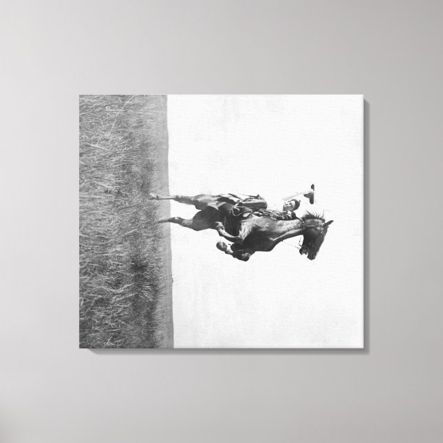 Cowboy Rides Bronco Rising on its Hing Legs Canvas Print (Front)