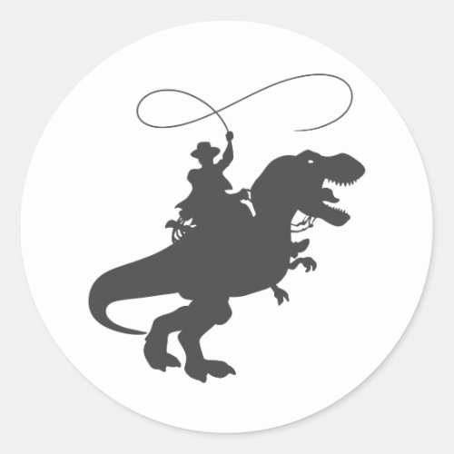 Cowboy riding dinosaur in the prehistoric era classic round sticker