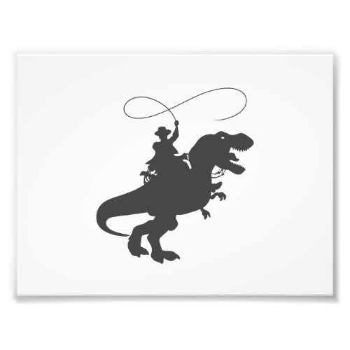 Cowboy riding dinosaur in the prehistoric era photo print